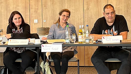 Teilnehmende eines Seminars